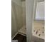Bathroom with shower, jetted tub and window at 240 Carsons Cv, Mcdonough, GA 30253