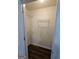 Open closet showcasing wire shelving and wood-look flooring at 240 Carsons Cv, Mcdonough, GA 30253