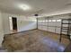 A clean two-car garage with an entrance into the home at 240 Carsons Cv, Mcdonough, GA 30253