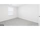 Bedroom with carpet flooring, one window, and white trim at 3413 Arabian Farm Ln, Dacula, GA 30019