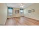 Bedroom with hardwood floors and neutral walls, offering a serene and comfortable living space at 1010 Pinehurst Dr, Peachtree City, GA 30269