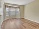 Empty bedroom with hardwood floors and a bay window at 1010 Pinehurst Dr, Peachtree City, GA 30269