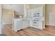 Clean kitchen featuring white cabinets and modern appliances at 1010 Pinehurst Dr, Peachtree City, GA 30269