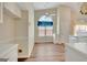 Eat-in kitchen area featuring a ceiling fan and a window with blinds at 1010 Pinehurst Dr, Peachtree City, GA 30269