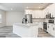 Modern kitchen featuring a center island, granite countertops, and stainless-steel appliances, great for entertaining at 3402 Arabian Farm Ln, Dacula, GA 30019