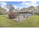 An above-ground pool sits in the backyard, framed by a charming deck and a well-maintained lawn at 12435 Hamilton Rd # 536/- Ac, Chattahoochee Hills, GA 30268