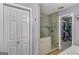 Elegant bathroom with glass-enclosed shower and walk in closet at 12435 Hamilton Rd # 536/- Ac, Chattahoochee Hills, GA 30268