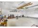 Spacious garage with overhead lighting, ample storage, and concrete flooring at 12435 Hamilton Rd # 536/- Ac, Chattahoochee Hills, GA 30268