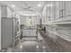 Modern kitchen with stainless steel appliances, granite countertops, and sleek white cabinetry at 12435 Hamilton Rd # 536/- Ac, Chattahoochee Hills, GA 30268