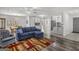 Open-concept living room flows into the kitchen and dining area, great for entertaining at 12435 Hamilton Rd # 536/- Ac, Chattahoochee Hills, GA 30268