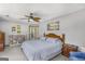Spacious main bedroom featuring a ceiling fan and neutral paint at 12435 Hamilton Rd # 536/- Ac, Chattahoochee Hills, GA 30268