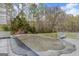 Covered pool on the deck with a scenic backyard view and seating at 12435 Hamilton Rd # 536/- Ac, Chattahoochee Hills, GA 30268