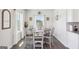 Bright dining room with natural light, table and chair set at 864 Maduro Way, Mcdonough, GA 30253