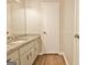 Bathroom with a granite countertop vanity and modern sink at 212 Bella Rosa, Peachtree City, GA 30269