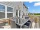 Charming backyard featuring an outdoor patio with garden and dining table at 176 Butler Rd, Brooks, GA 30205