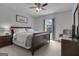 Cozy bedroom with a sleigh bed, side table, and natural light at 176 Butler Rd, Brooks, GA 30205
