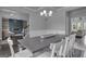 Open-concept dining area with adjacent living room and stairway at 176 Butler Rd, Brooks, GA 30205