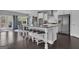 Beautiful kitchen with a large island, modern appliances, and a breakfast nook at 176 Butler Rd, Brooks, GA 30205