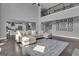 Open-concept living space with hardwood floors and a staircase to the second floor at 176 Butler Rd, Brooks, GA 30205