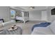 Open concept main bedroom with seating area, bedroom suite, and carpeted floor at 176 Butler Rd, Brooks, GA 30205