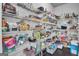 Walk-in pantry offers ample storage with multiple shelves for organized food and kitchen essentials at 176 Butler Rd, Brooks, GA 30205