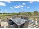 An overhead view displays the pool, green lawn and outdoor firepit at 176 Butler Rd, Brooks, GA 30205