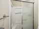 Bathroom features a white shower with a metal towel rack at 5296 Golfcrest Cir, Stone Mountain, GA 30088