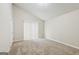 A spacious bedroom with vaulted ceiling and sliding glass doors showcases ample natural light and neutral decor at 5296 Golfcrest Cir, Stone Mountain, GA 30088
