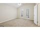 Bedroom features neutral walls, two windows, and a ceiling fan at 5296 Golfcrest Cir, Stone Mountain, GA 30088