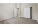 Bright bedroom features ample closet space and neutral carpeting for a welcoming atmosphere at 5296 Golfcrest Cir, Stone Mountain, GA 30088