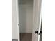 Open closet with shelving and carpeted floor at 1751 S Olympian Way, Atlanta, GA 30310