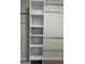 Walk-in closet features custom white shelving and plenty of storage space at 1751 S Olympian Way, Atlanta, GA 30310
