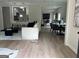 Bright living room featuring hardwood floors and an open concept design, great for entertaining at 1751 S Olympian Way, Atlanta, GA 30310