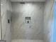 Marble tiled shower featuring rainfall shower head at 1751 S Olympian Way, Atlanta, GA 30310