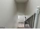 Interior staircase with white painted railings and hardwood-style flooring at 1751 S Olympian Way, Atlanta, GA 30310