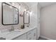 Well lit bathroom featuring a double vanity with modern finishes and updated fixtures at 105 Honey Creek Rd, Mcdonough, GA 30252
