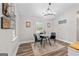 Cozy dining area with a round table, comfortable seating, and a stylish light fixture at 105 Honey Creek Rd, Mcdonough, GA 30252