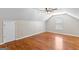 Large bonus room with hardwood floors and great natural light from the window at 155 Duncans Mill Dr, Locust Grove, GA 30248
