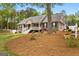Charming single-story home with a welcoming front porch and well-maintained yard at 155 Duncans Mill Dr, Locust Grove, GA 30248
