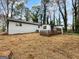 Large backyard with spacious wood deck offering ample room for recreation and relaxation at 2800 Chelsey Trl, Jonesboro, GA 30236