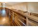 Upper-level hallway with wooden railings at 6140 Ginn Se St, Covington, GA 30014