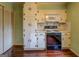 Classic kitchen featuring white cabinets, tiled backsplash, and vintage oven at 6140 Ginn Se St, Covington, GA 30014