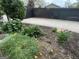 The backyard garden is full of life and color at 6121 N Main Se St, Acworth, GA 30101