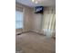 Bedroom featuring a window with blinds, drapes and plush carpeting at 6121 N Main Se St, Acworth, GA 30101