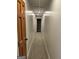 Hallway leading to the doorway in the back at 6121 N Main Se St, Acworth, GA 30101