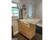 Cozy kitchen corner with drawers, granite counters, and stainless dispenser at 6121 N Main Se St, Acworth, GA 30101
