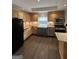 Kitchen featuring wood counters, farmhouse sink, stainless appliances, and wood cabinets at 6121 N Main Se St, Acworth, GA 30101