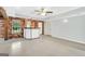 Finished basement featuring a bar, unique ceiling and access to the outside at 70 Barrington Farms Ct, Sharpsburg, GA 30277