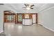 Finished basement featuring a bar, unique ceiling and an adjacent brick area at 70 Barrington Farms Ct, Sharpsburg, GA 30277