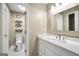 Bathroom featuring a toilet and vanity with sink at 70 Barrington Farms Ct, Sharpsburg, GA 30277
